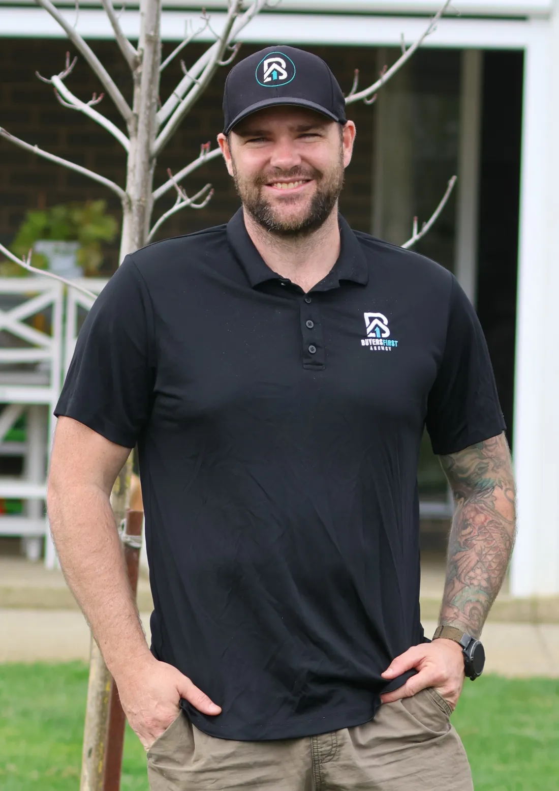 Dan White, founder of Buyers First Agency, in the backyard at home